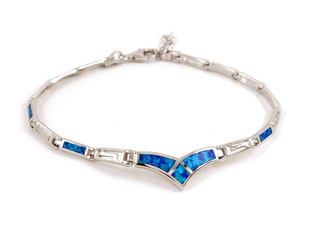 Elegant sterling silver 925 jewelry with blue opal stones and intricate Greek key meander design. Adjustable length from 19 to 21 cm, with a width of 3 to 8 mm. Handmade in Greece, perfect for any occasion.