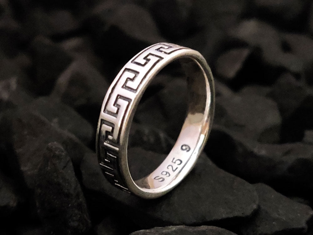 Greek ring made of Sterling Silver 925 with the Greek Key Meander design placed on black stones. Free shipping included.