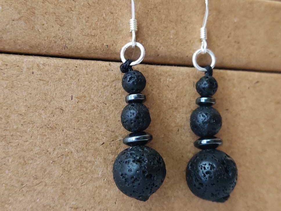 "Handcrafted volcanic lava stone dangle earrings with sterling silver ear wires, featuring 10mm, 6mm, and 4mm stones – made in Greece with free worldwide shipping."

