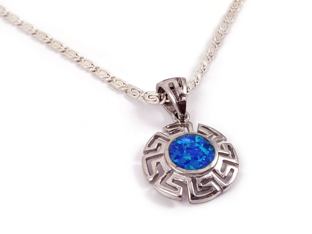 Elegant silver pendant with blue opal stone, 17 mm, on a 2 mm wide Greek infinity chain.
