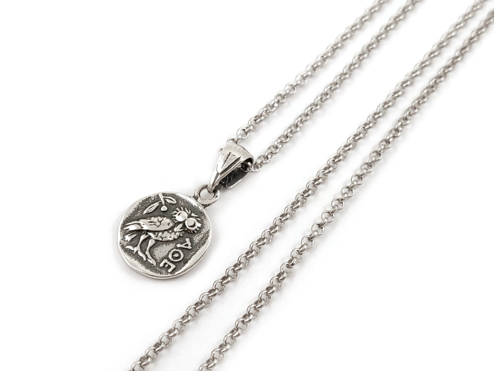 Features a 13 mm pendant with intricate Greek Owl & Goddess Athena design. Made in Greece with a 2 mm sterling silver chain, Hallmarked 925.