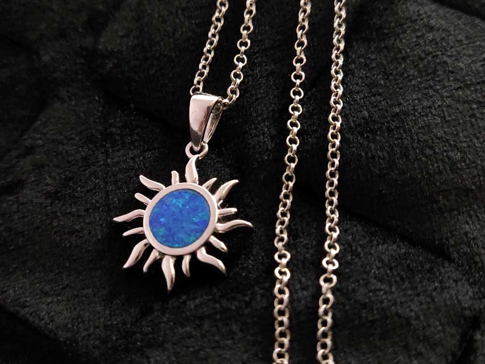 Handcrafted Greek Silver Necklace featuring Sun Design Pendant.
