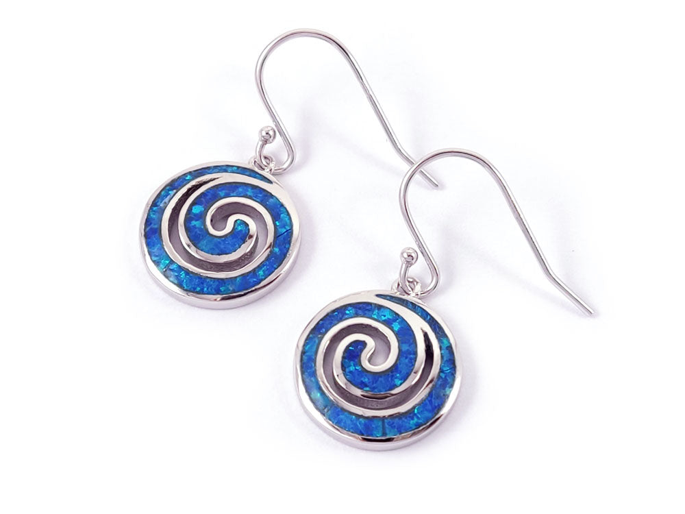 Close-up of Greek Spiral Infinity Dangle Earrings – A detailed view of the Sterling Silver 925 earrings showcasing the intricate Greek spiral infinity design with vibrant blue opal stones, gleaming with elegance.

