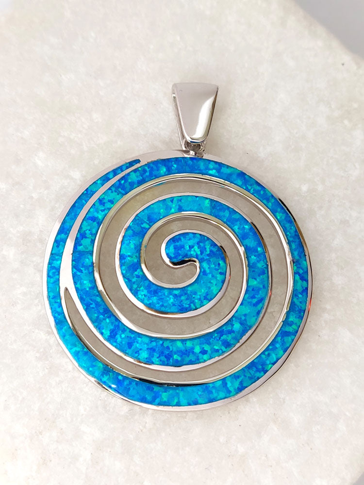 35mm sterling silver blue opal pendant worn on necklace