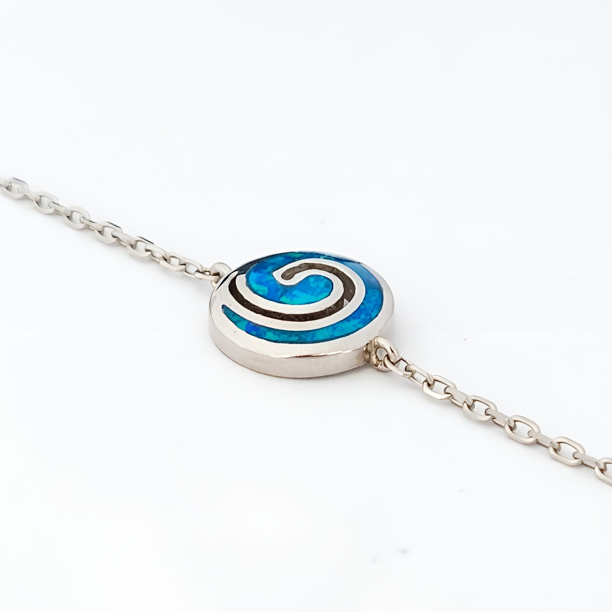 Close up of blue opal Greek spiral bracelet