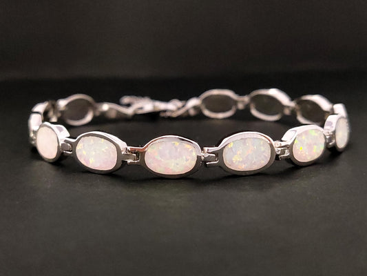 Elegant Sterling Silver 925 Bracelet with Stunning Fire Rainbow White Opal Oval Stones, Adjustable Length, Hallmarked 925, Crafted in Greece, and Includes Free Shipping