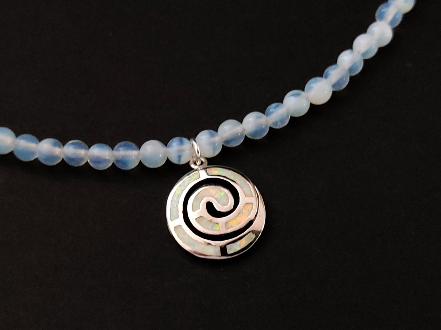 Greek necklace made of silver white opal spiral pendant and moonstone beads of 4mm.