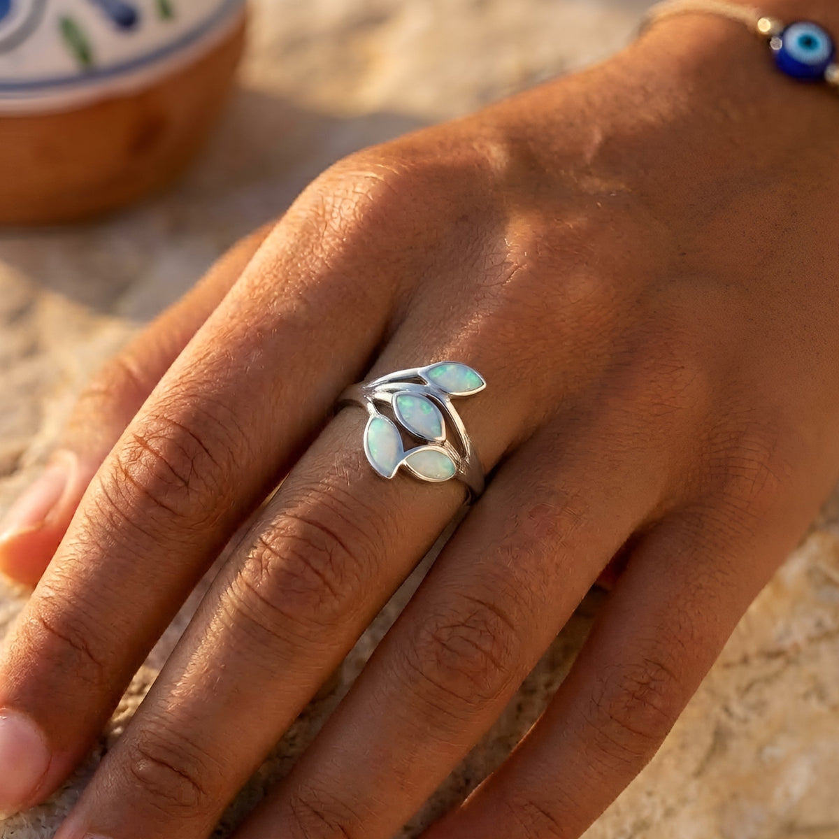Hallmarked 925 Greek ring with white opal and leaf motif