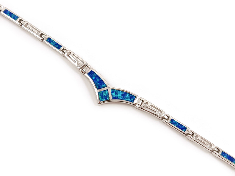 Sterling silver 925 bracelet featuring blue opal stones and a Greek key meander design. Adjustable length from 19 to 21 cm (7.41 to 8.19 inches), with a width ranging from 3 mm (0.11 inches) to 8 mm (0.31 inches). Made in Greece.