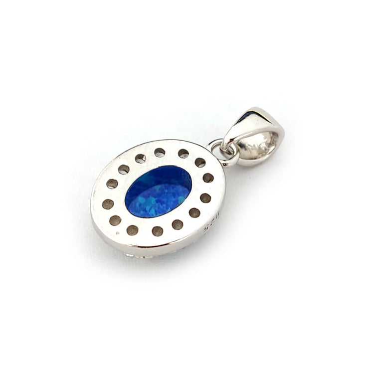 Close-up of oval pendant featuring sterling silver 925, blue opal, and cubic zirconia