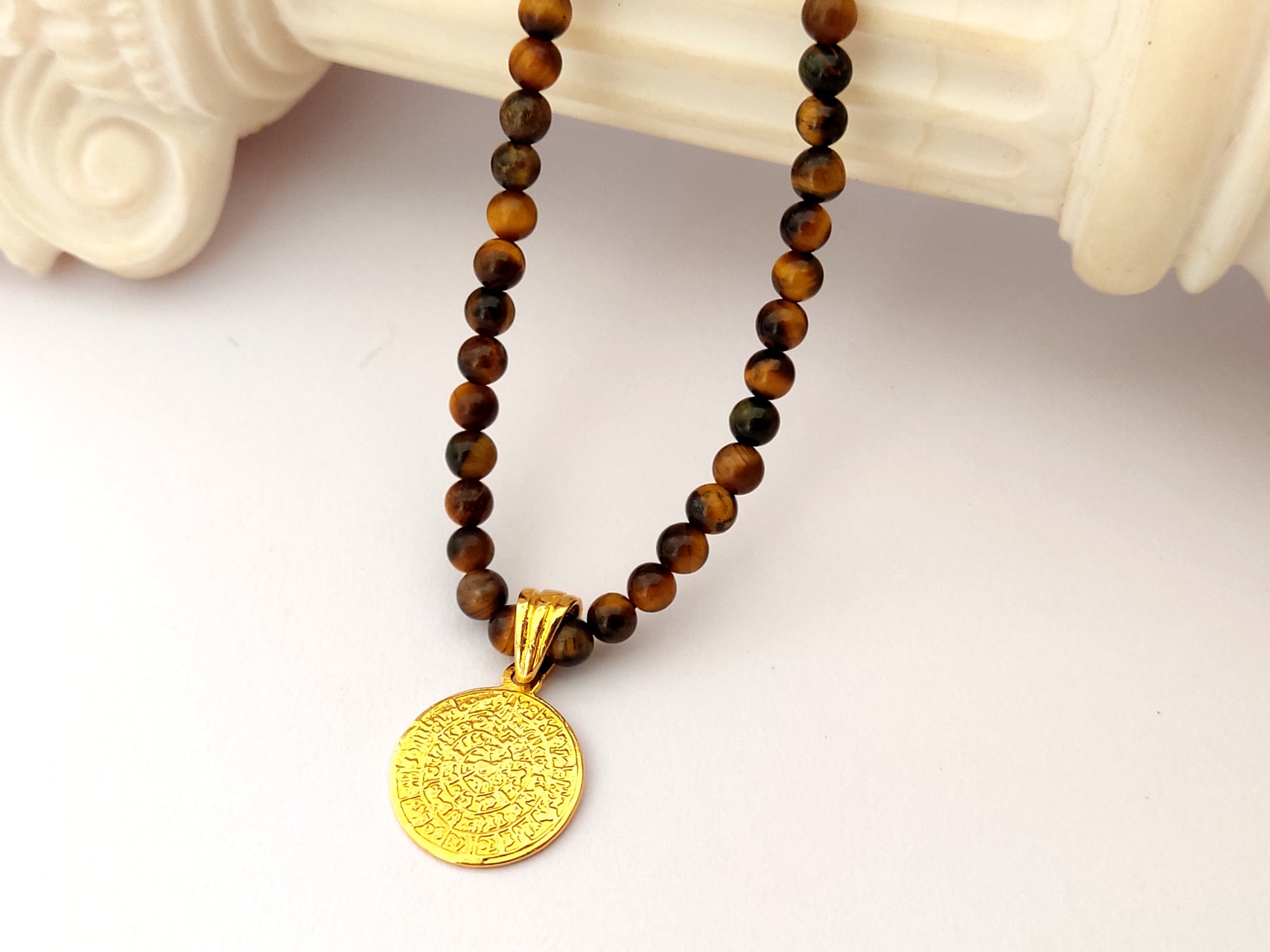 Phaistos Disc necklace with tiger's eye stones and gold plated silver greek pendant.
