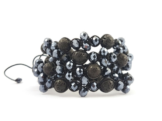 Black shamballa macrame bracelet with lava stones on wrist