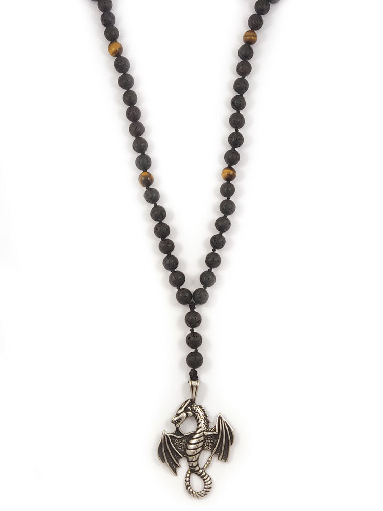 Greek artisan necklace showcasing earthy tones and textured Lava Stones with a symbolic dragon pendant.
