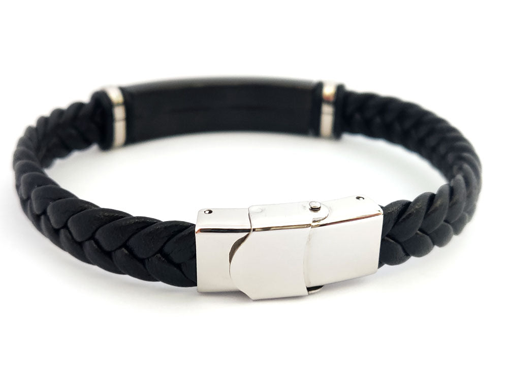 “Close-up of Greek Meander design on men’s stainless steel and leather bracelet”


