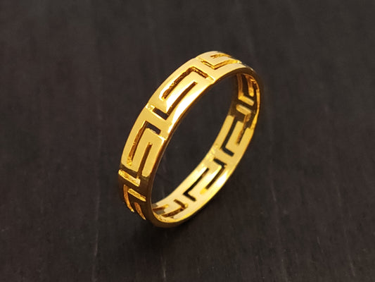 Greek Key gold plated ring made of sterling silver 925 on black background