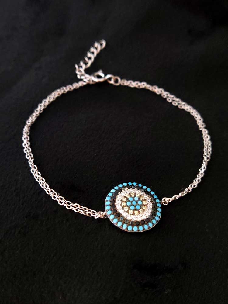 Handcrafted in Greece sterling silver Evil Eye pendant with turquoise and crystal accents, adjustable chain 16–19 cm, representing protection against negative energy.
