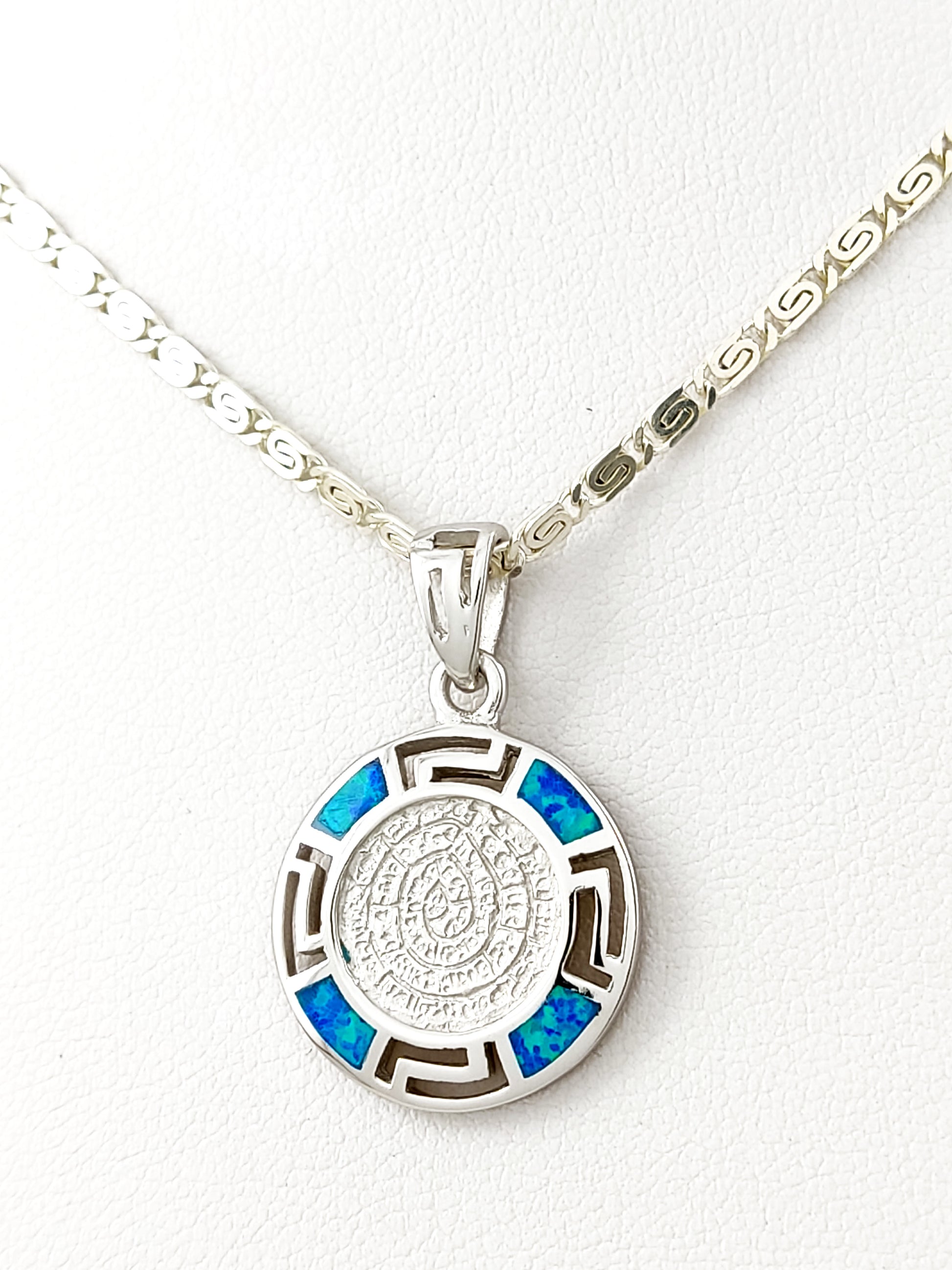Silver necklace from Greece with the Phaistos Disc pendant  together with blue opal stones.