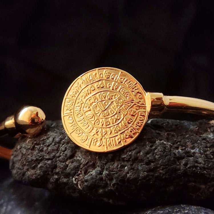 Gold-plated sterling silver Phaistos Disc cuff bracelet – Handcrafted in Greece, featuring an ancient Minoan-inspired design.

