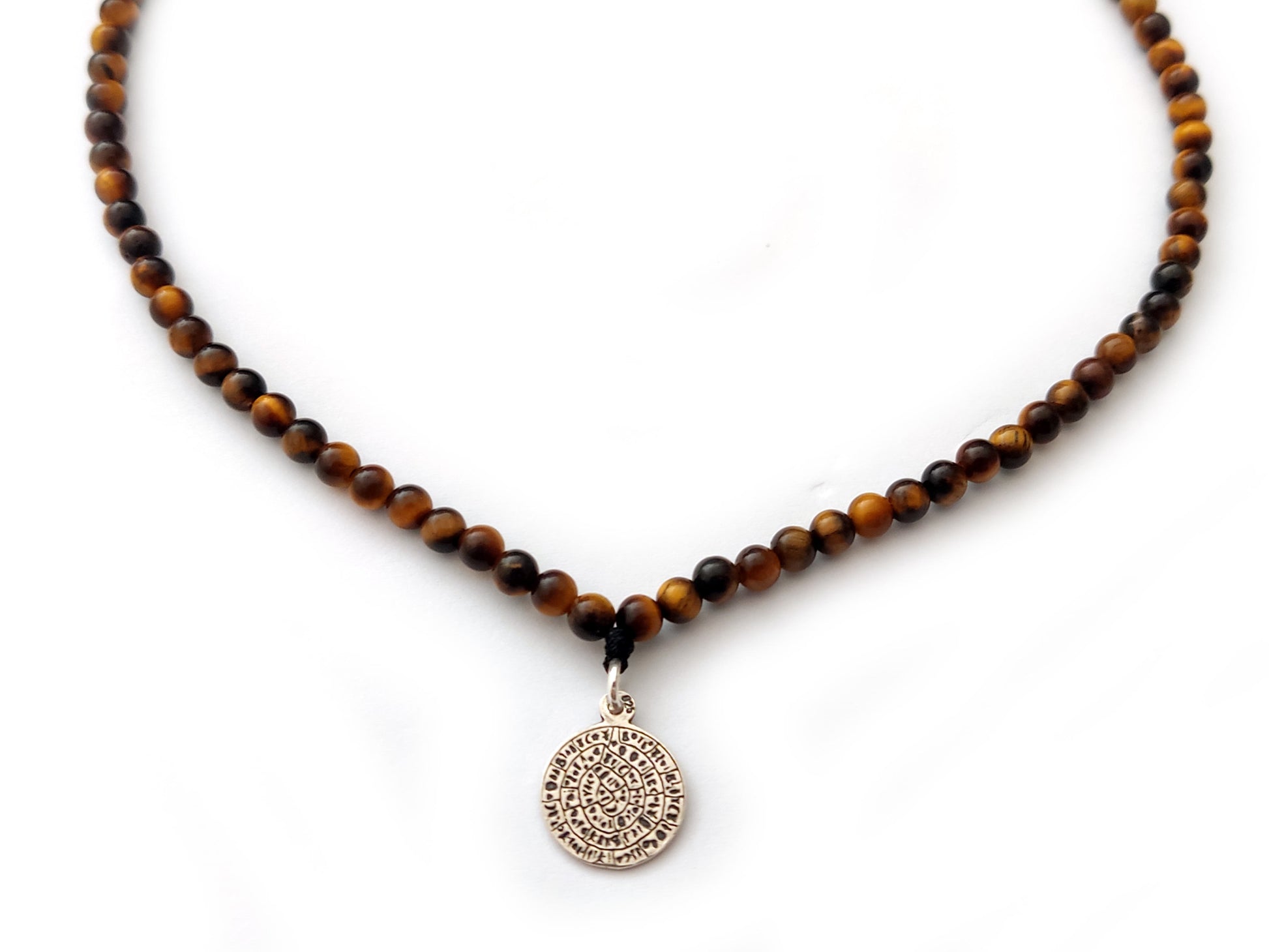 Phaistos Disc silver pendant measuring 13mm with tiger's eye stones 4mm
