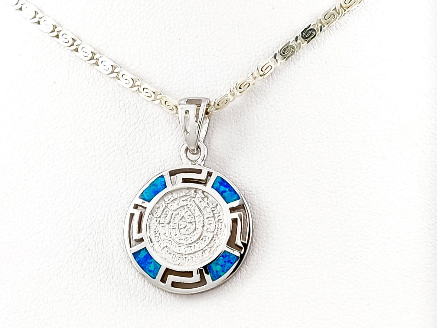 Phaistos disc blue opal silver necklace from Greece. The pendant meeasures 18mm and the chain is 2mm in width and available in all sizes.
