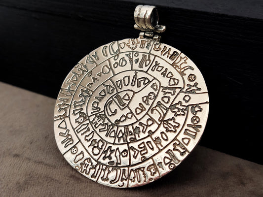 Big Phaistos Disc silver pendant measuring 54mm from Greece.