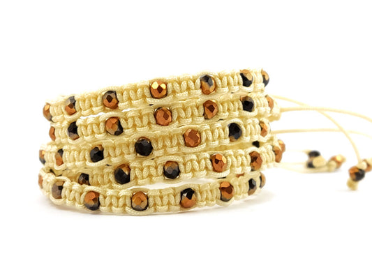 Handmade Shamballa macrame bracelet with bronze-black crystals on sand-cream cord