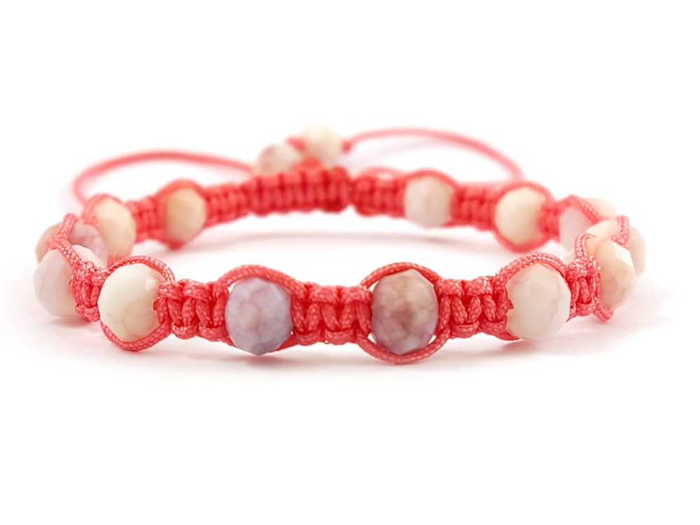 Boho style pink macrame bracelet on wrist