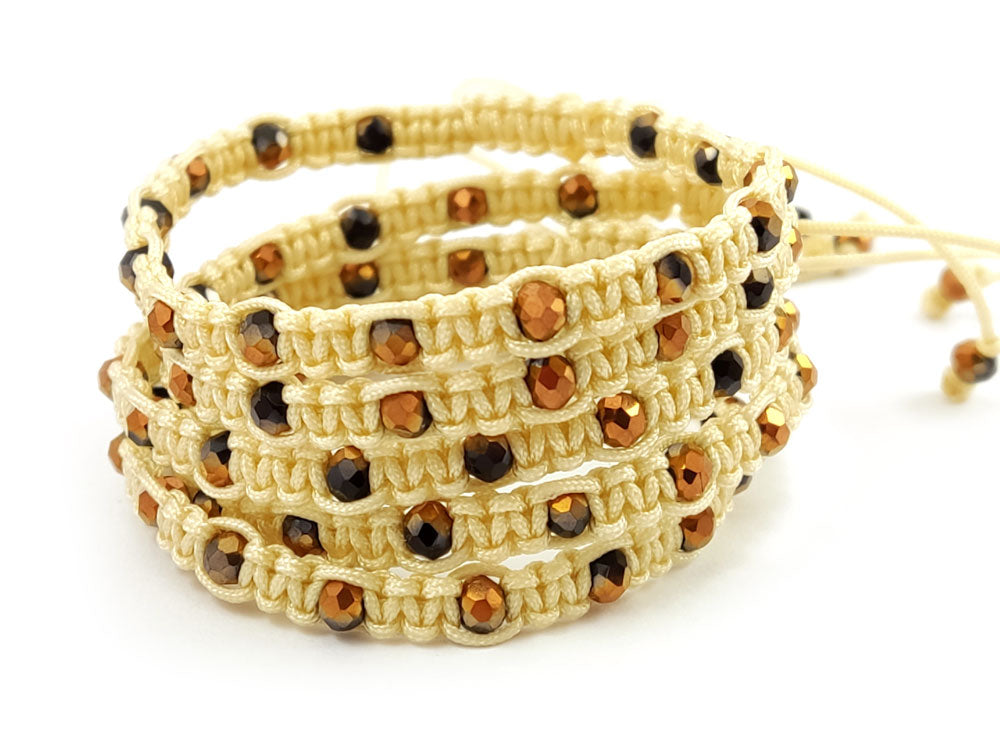 Close-up of 4mm bronze-black crystal beads on macrame bracelet