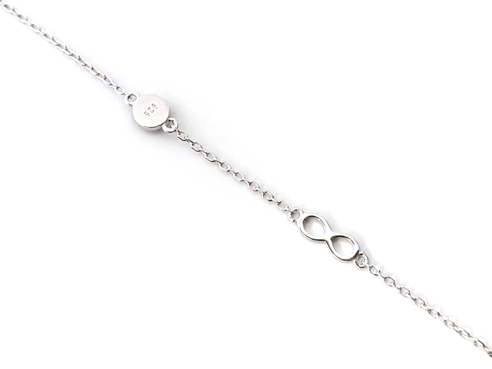 Hallmarked sterling silver evil eye bracelet with 17–19 cm adjustable chain


