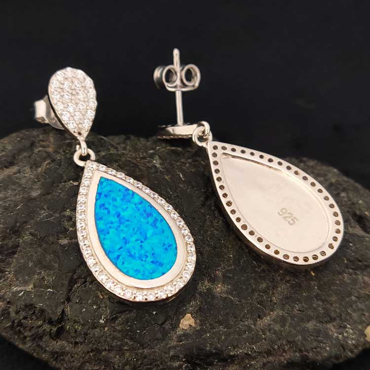 Close-up of Blue Opal and Cubic Zirconia Sterling Silver Earrings with hallmark 925