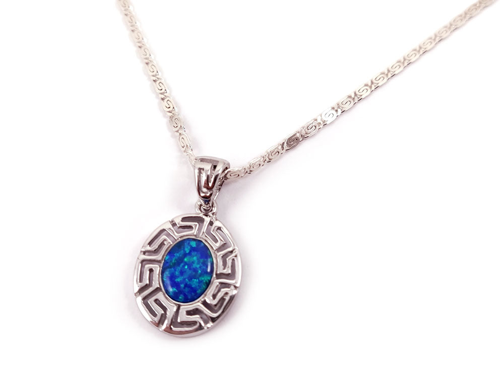 Elegant Greek key infinity silver pendant with blue opal, 0.70x0.62 inches in size.
