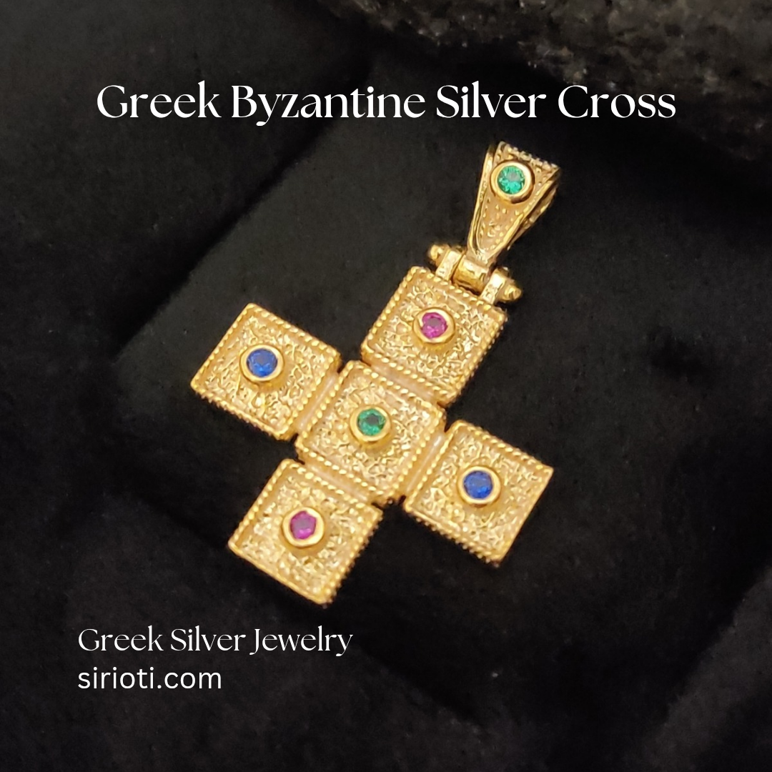 "Close-up of sterling silver 925 Greek cross pendant, gold finish, and traditional Byzantine style."
