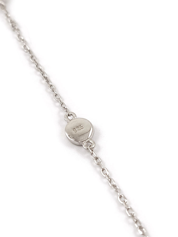 Minimalist sterling silver 925 necklace with an infinity pendant (13 x 6 mm) and a 5 mm evil eye charm on a white background. The adjustable chain is 40-43 cm long. Hallmarked 925. Made in Greece. Free shipping worldwide.

