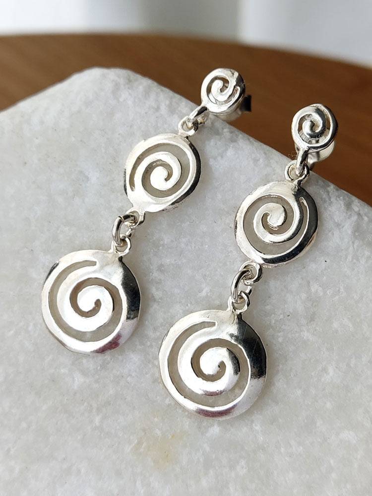Greek spiral symbol sterling silver stud earrings close-up