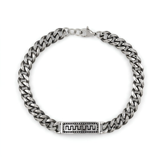 Greek stainless steel bracelet on white background.