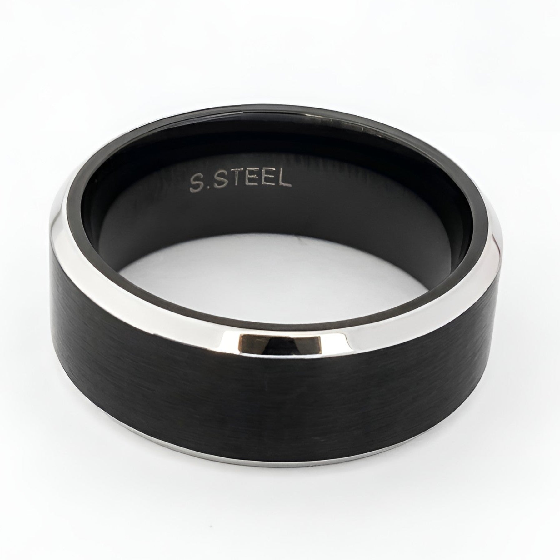 A black steel band ring with a polished silver-colored metallic rim, featuring the text 'S. STEEL' engraved inside the band, set against a plain white background.