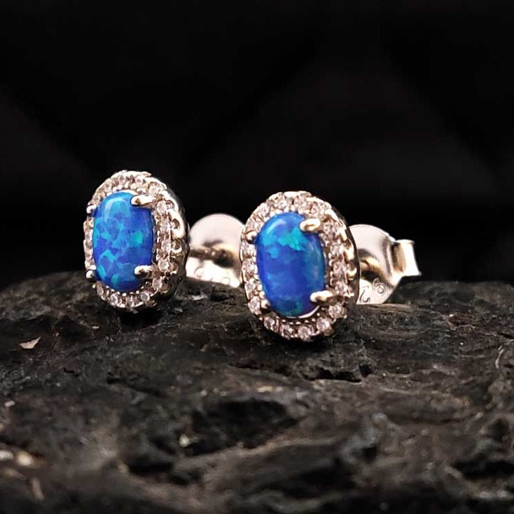 blue opal stud earrings – A touch of Aegean-inspired elegance to elevate any outfit effortlessly.