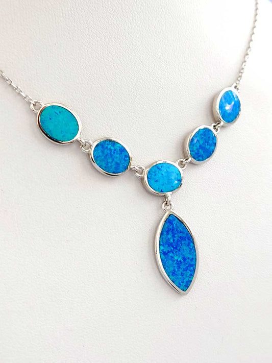 Sterling silver necklace with oval and drop-shaped blue opal stones


