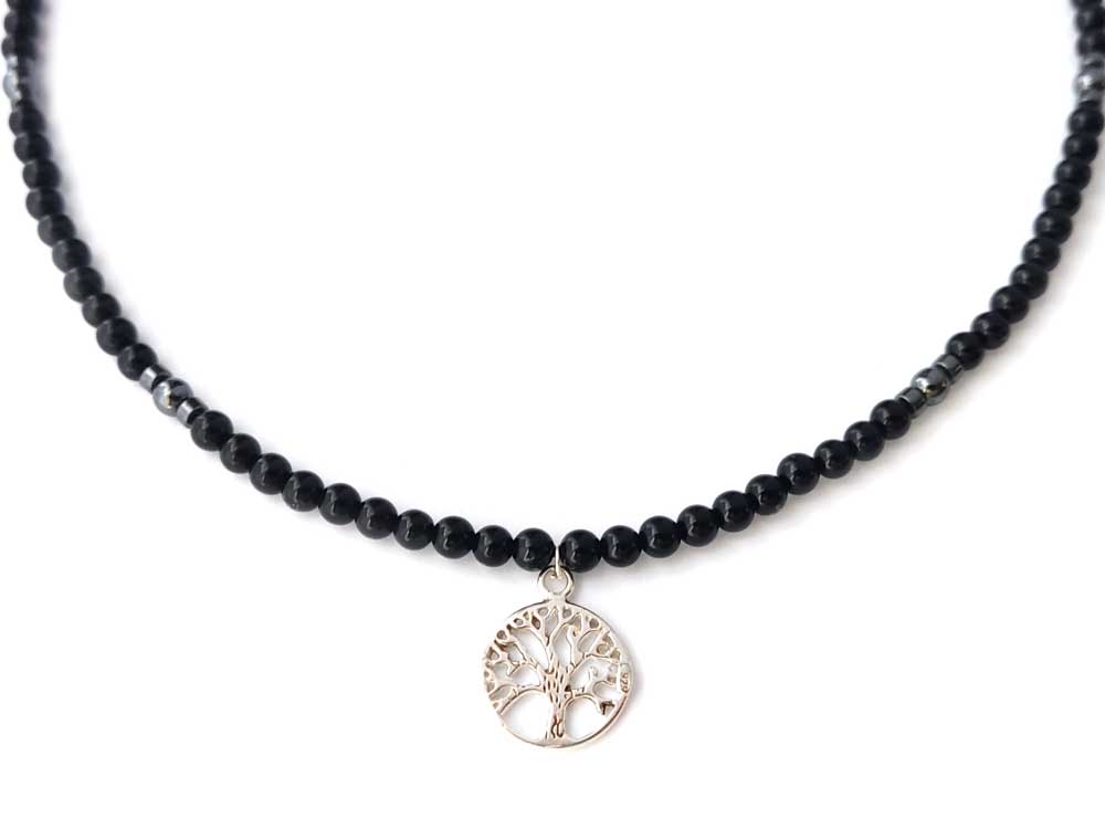 Black natural onyx necklace with silver pendant depicting the Tree Of Life design. Handmade in Greece.