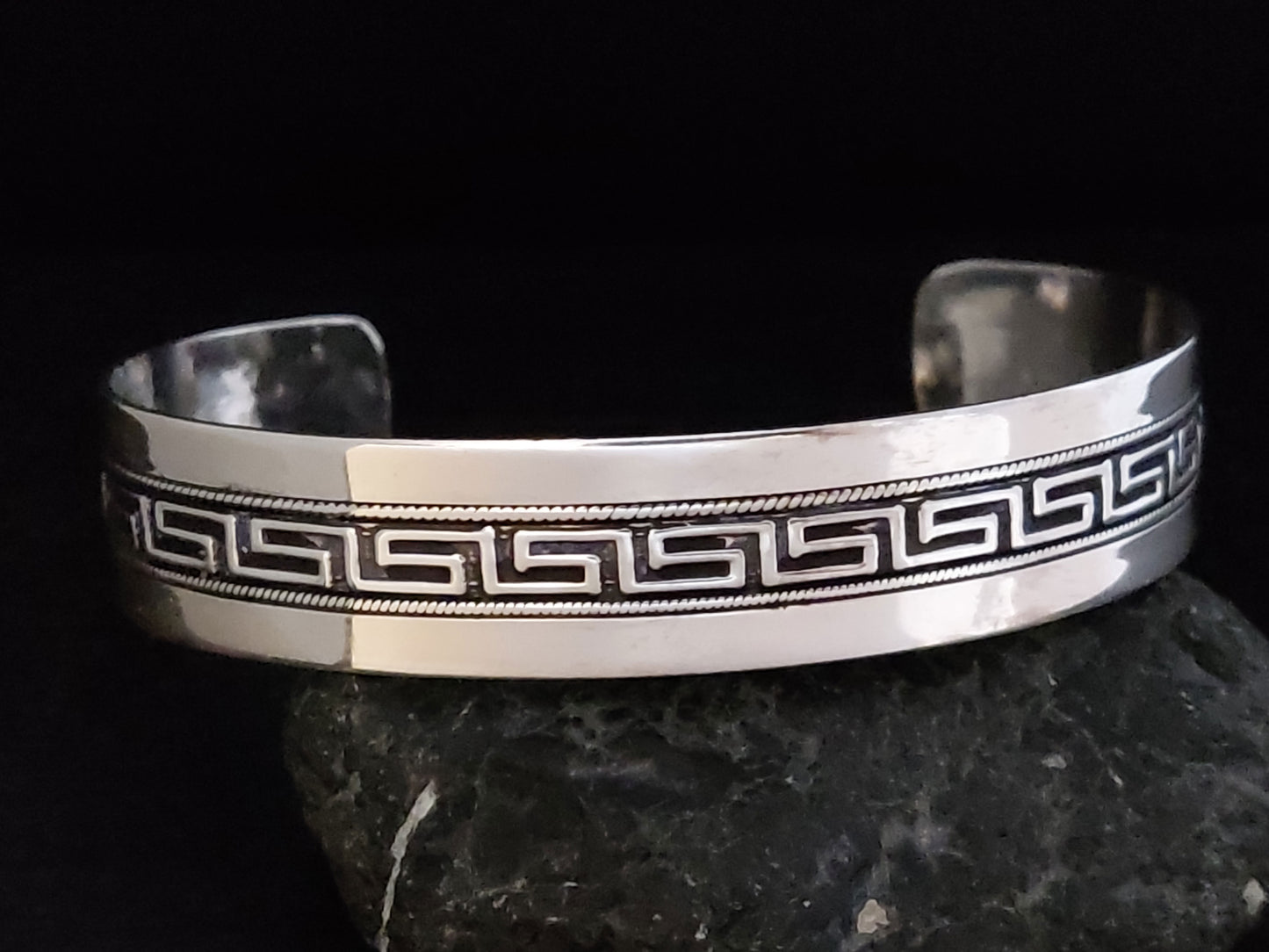 Greek silver cuff bracelet made in Greece with the meander design.