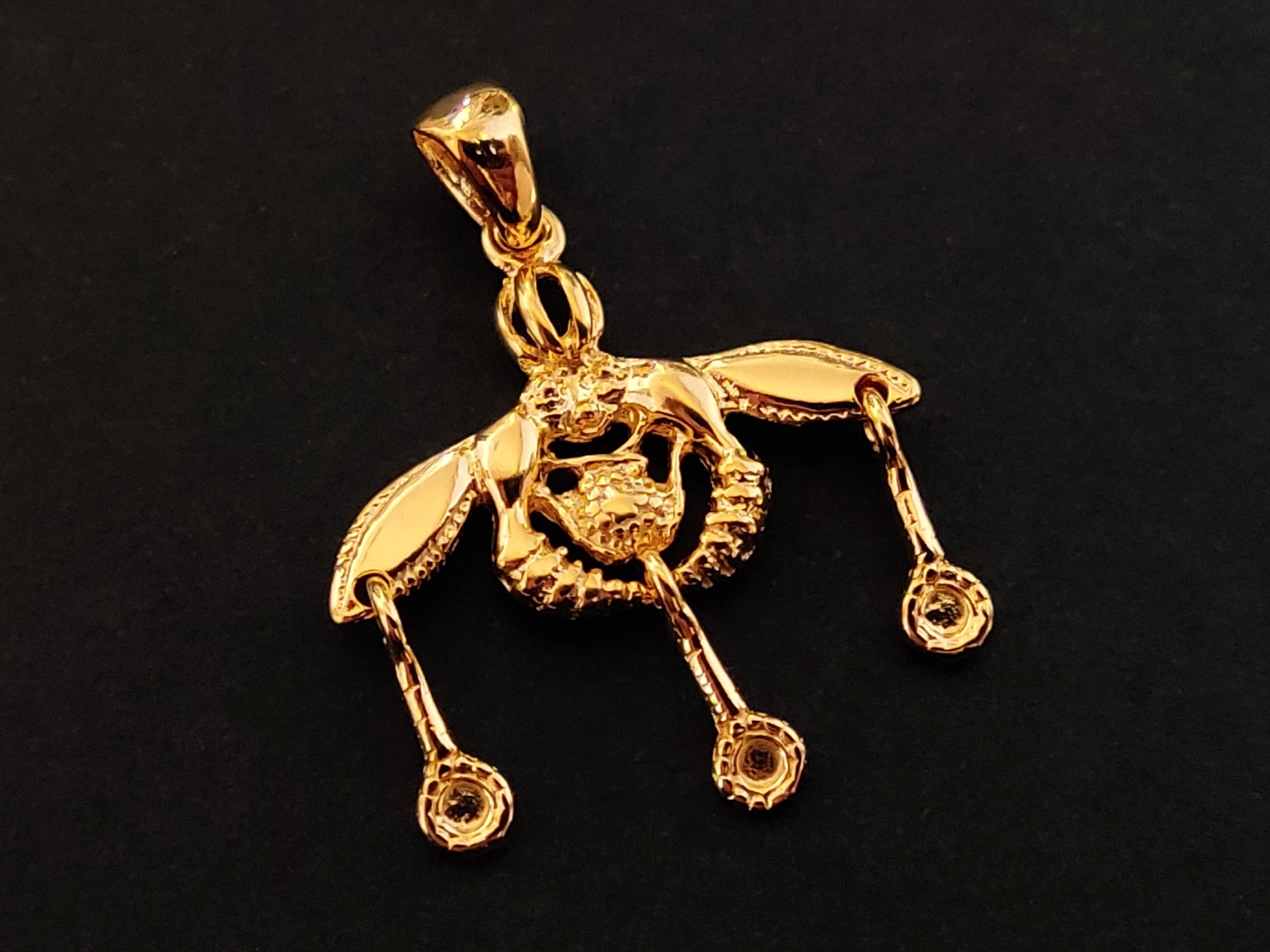 Greek silver pendant with the minoan bees design with gold plated finish measuring 25 mm