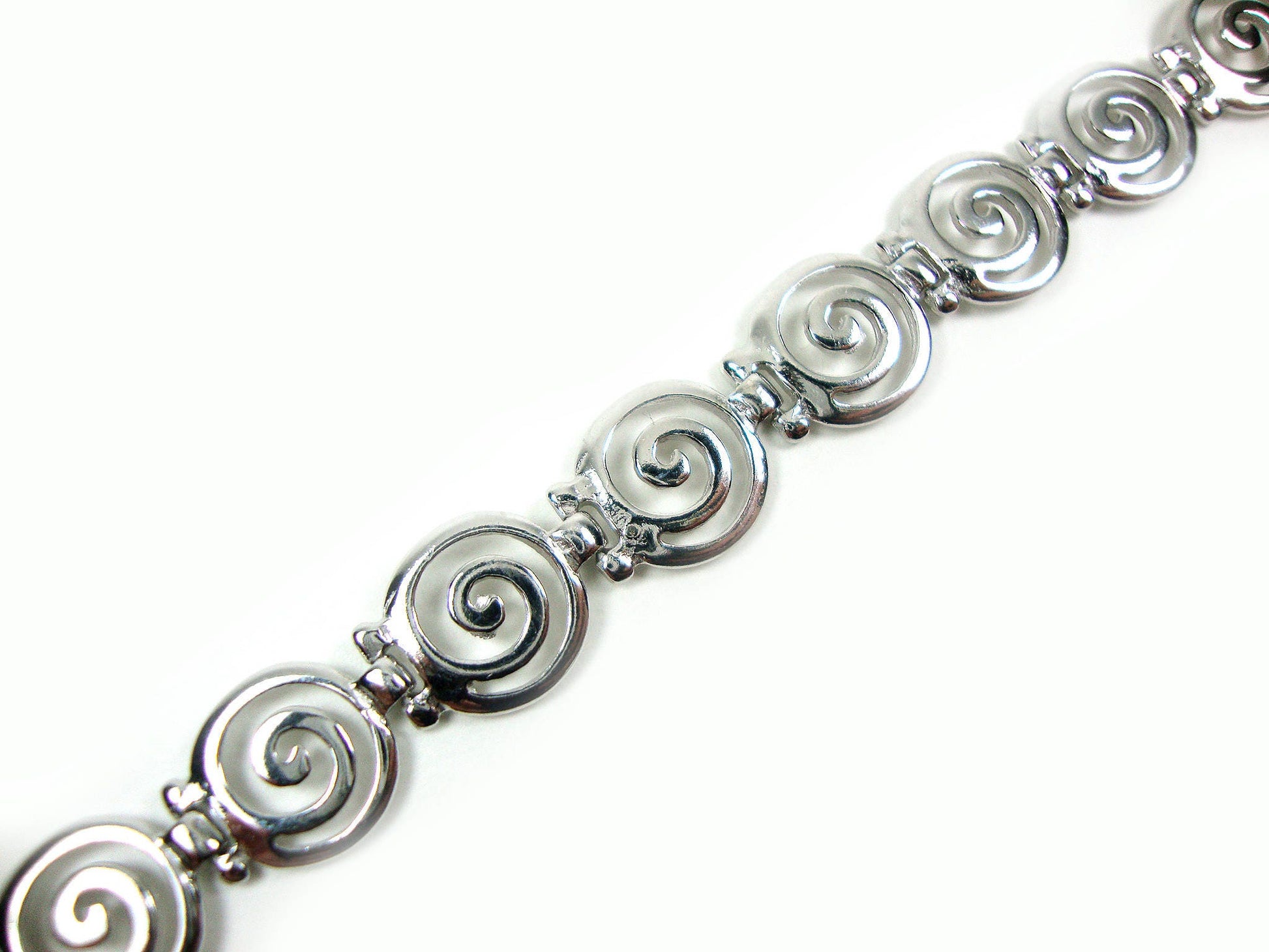 Greek silver bracelet with the spiral design measuring 10mm width.