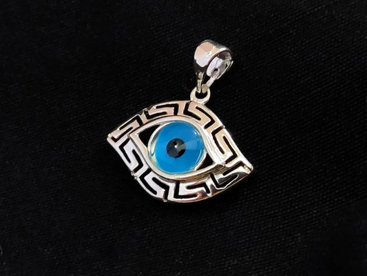 Silver pendant in evil eye shape and with the Greek Key.