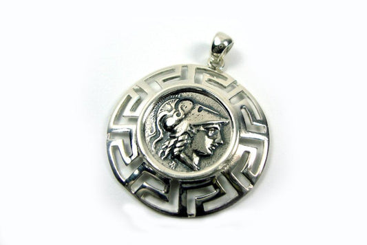 A silver pendant that depicts goddess Athena and the Greek key measuring 33mm in diameter.