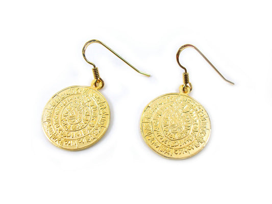 Phaistos Disc dangle gold plated earrings on white background.
