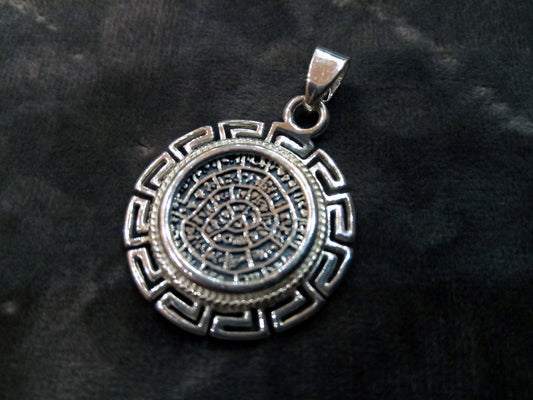 An elegant Sterling Silver 925 pendant featuring an Ancient Greek Minoan Phaistos Disc design, with a diameter of 25 mm (0.97 inches). Handcrafted in Greece, showcasing exquisite craftsmanship and cultural heritage. Enjoy complimentary shipping!
