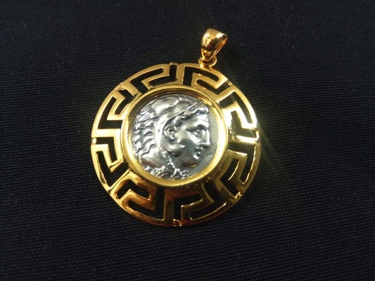 Handcrafted Sterling Silver 925 Pendant featuring an Alexander the Great pendant motif within a gold-plated Meander Greek Key frame. Diameter: 32mm. Made in Greece.