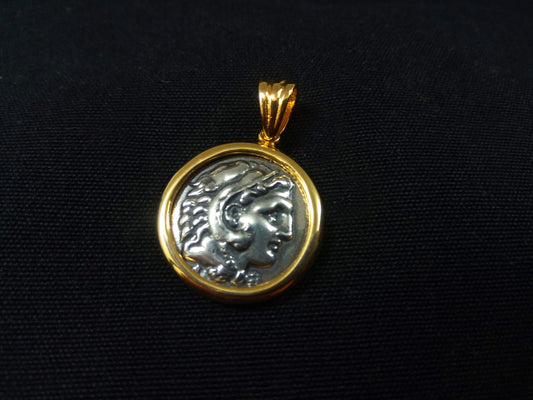 A luxurious Greek Silver Pendant crafted from Sterling Silver 925 and framed in Gold Plated 22K Sterling Silver 925, featuring an Alexander the Great motif. Size: 21mm (0.81 inches). Made in Greece.