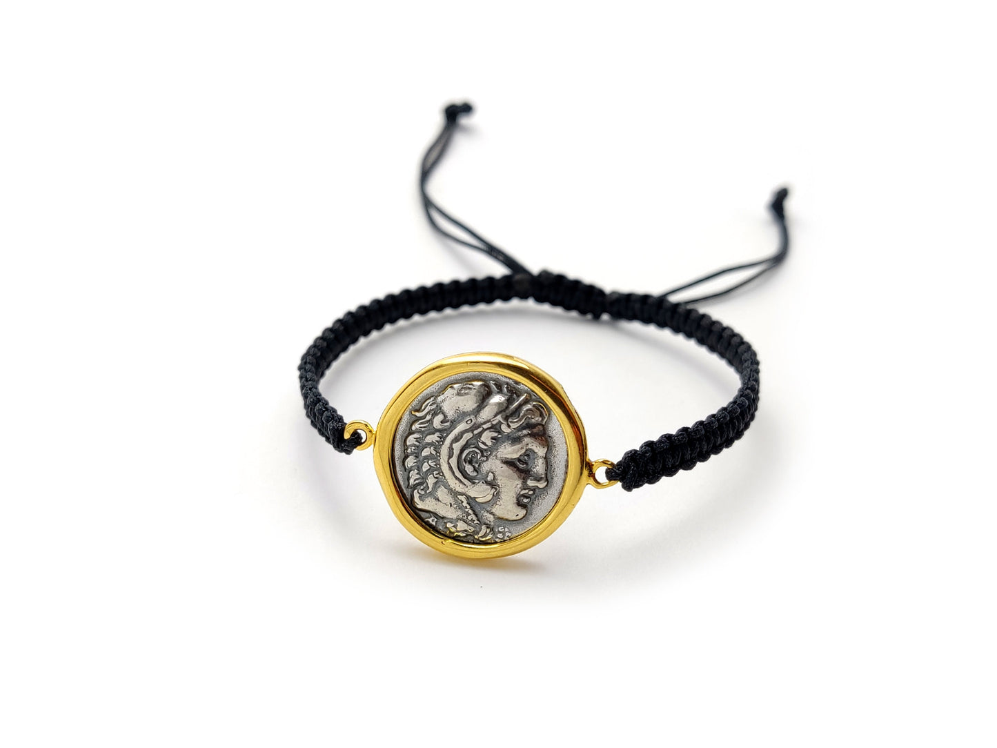 Image of a Sterling Silver 925 Alexander The Great Bracelet featuring a Gold Plated 22K Coin Frame, sized at 21mm (0.81 inches), with a Hallmark 925 stamp, handmade in Greece, and paired with a sleek black cord.