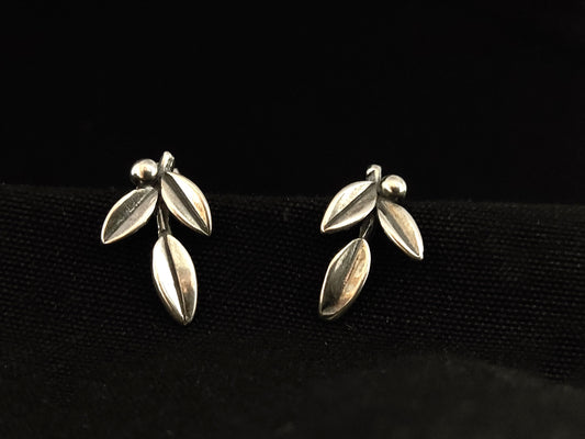 Close-up view of exquisite Sterling Silver 925 Ancient Greek Olive 3 Leaves Stud Earrings, handcrafted in Greece, showcasing intricate details and cultural significance.